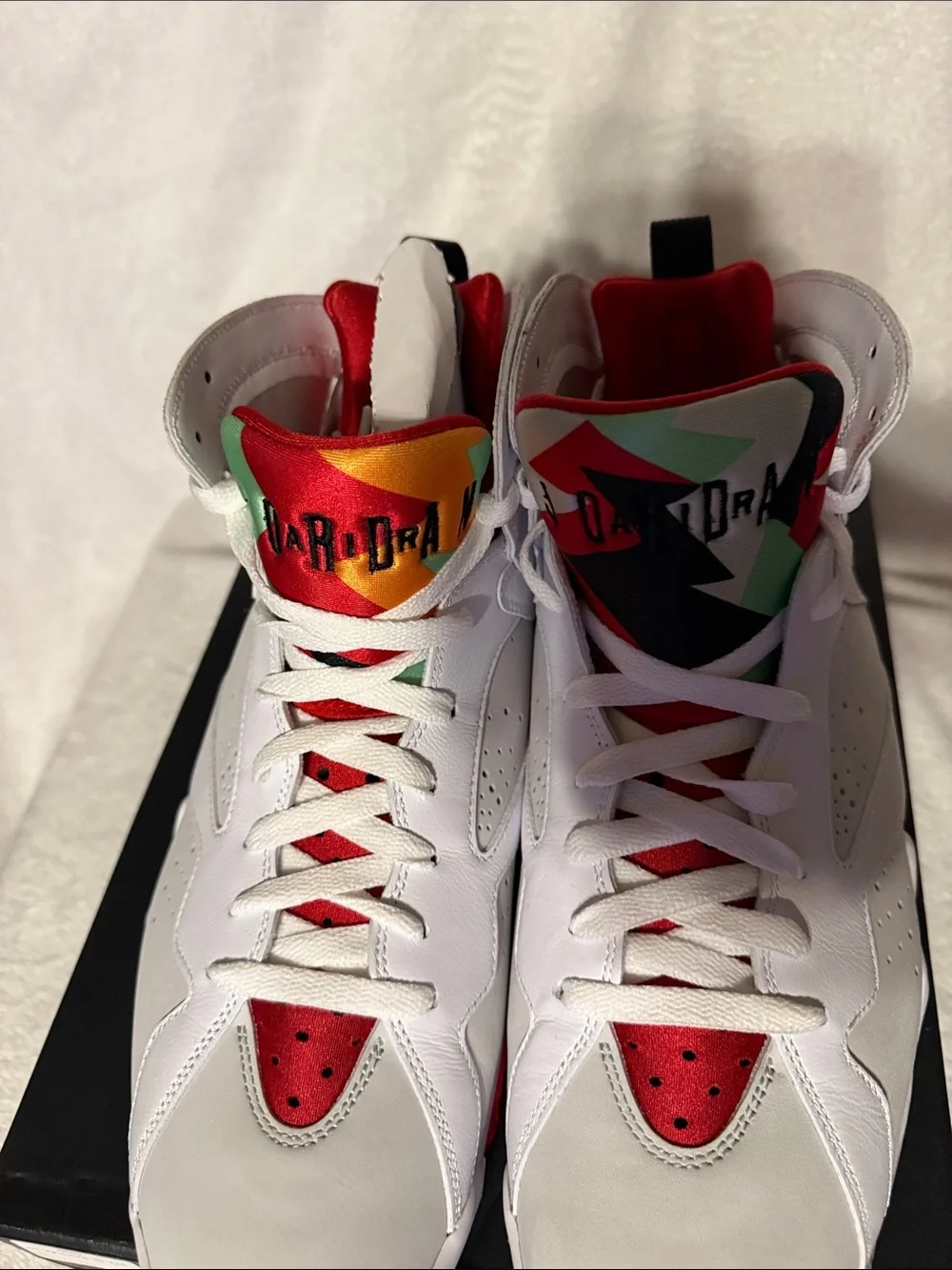 2015 Jordan 7 Retro White Sneakers with Red, Green & Orange Accents